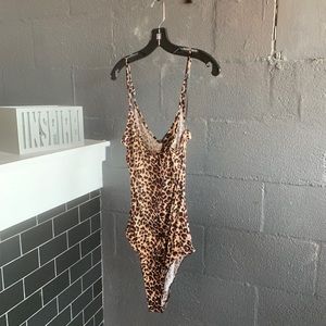 Cheetah print body suite available in many sizes